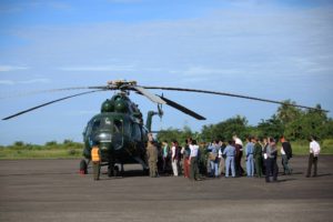 Senior diplomats from the U.N., United States, China, Britain, the European Union and India board an helicopter in Sittwe to visit the troubled Rohingya villages in the Maungdaw area in northern Rakhine State in Myanmar Novenber 2, 2016. 