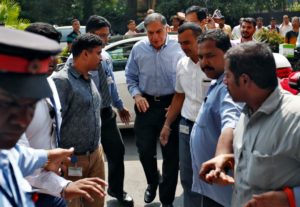 Tata Sons Chairman Ratan Tata (C) arrives in his office after attending a meeting at the company's head office in Mumbai, India, October 25, 2016. 