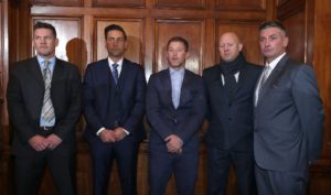 From left, former soccer players Mark Williams, Andy Woodward, Steve Walters, Jason Dunford and Matt Monaghan pose for the media at the launch of the Offside Trust at the Midland Hotel in Manchester, England, Monday, Dec. 5, 2016. 