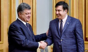 Ukrainian President Petro Poroshenko (left) meets Mikheil Saakashvili (right) in Kiev