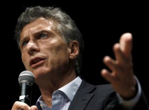 Mauricio Macri, Buenos Aires' City Mayor and presidential candidate for the Cambiemos (Let's Change) alliance, answers question during a news conference in Buenos Aires, November 10, 2015.  