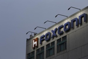 The logo of Foxconn, the trading name of Hon Hai Precision Industry, is seen on top of the company's headquarters in New Taipei City, Taiwan March 29, 2016. 