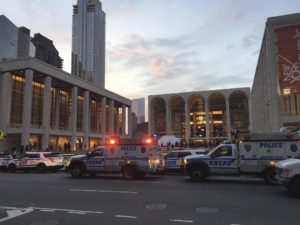 Police respond to New York's Metropolitan Opera which halted a performance after someone sprinkled an unknown powder into the orchestra pit, Saturday, Oct. 29, 2016. 