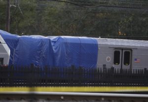 A New Jersey Transit train is moved on the track out of the Hoboken Terminal, Thursday, Oct. 6, 2016, in Hoboken, N.J., a week after the train crashed into the station, killing one person and injuring more than 100 people.
