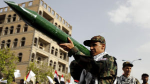 A Houthi militant holds a mock missile during a rally marking al-Quds (Jerusalem) Day in Yemen's capital Sanaa.