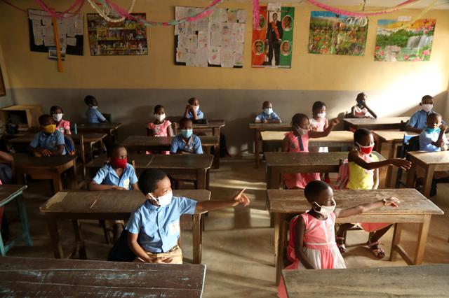 Ivory Coast children head back to school after virus shutdown
