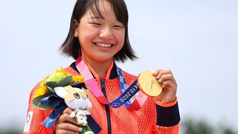 Schoolgirl scoops gold as Japan warms to the Games