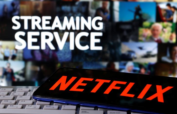 exclusively reports Netflix raises monthly subscription prices in U.S., Canada; market reacts