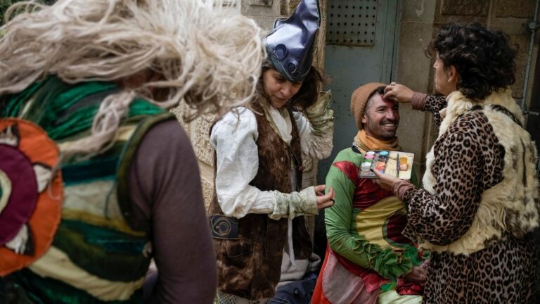 Jerusalem marks festive holiday of Purim in shadow of war