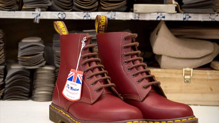 Dr. Martens shares plunge to record low, trading halted on weak outlook